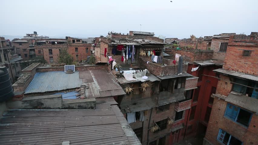 A top view of the windows and residential houses in a poor neighborhood,