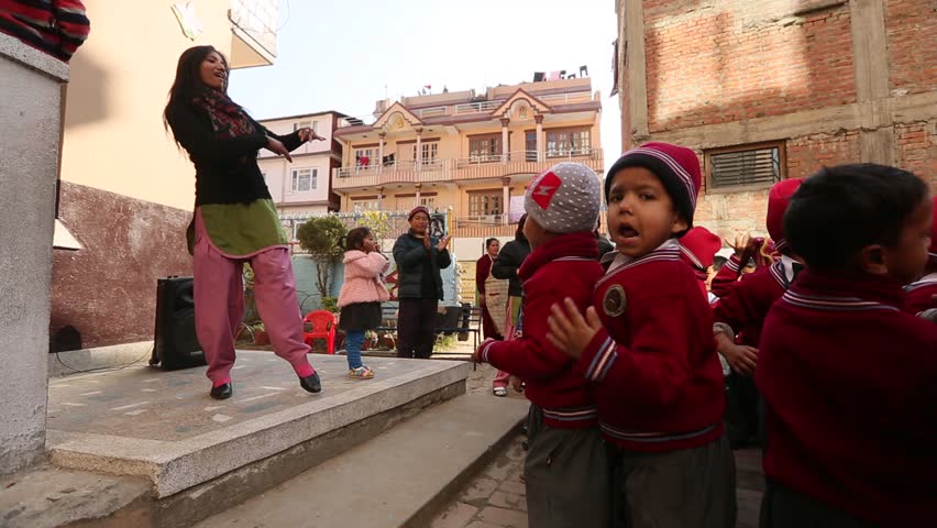 KATHMANDU, NEPAL - DEC 22: Unknown pupils during dance lesson in primary school,