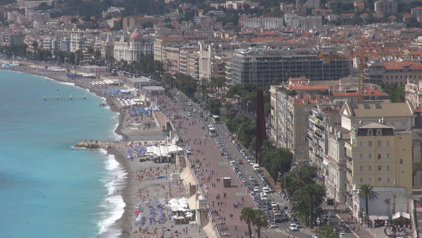 NICE, FRANCE - SEPTEMBER 9, 2013, Aerial view of Nice city with traffic street and  Promenade des Anglais boulevard by day