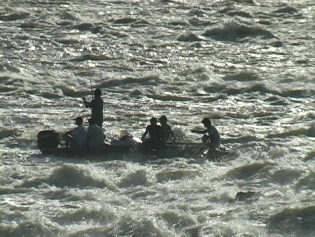 people in a boat fishing