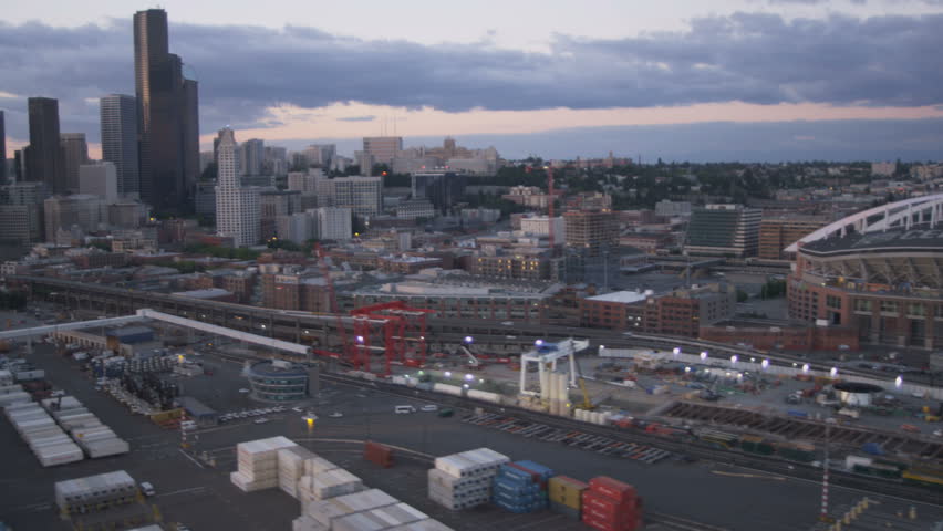 Seattle - July 2013: Aerial dusk view CenturyLink Field Baseball Stadium, Port of Seattle docks Pacific Northwest, Washington State, USA, RED EPIC, 4K, UHD, Ultra HD resolution