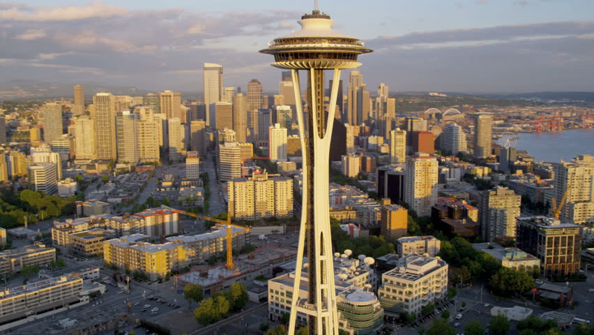 Seattle - July 2013: Aerial view at sunset downtown Seattle skyscrapers Space Needle Port of Seattle Washington State, Pacific Northwest, USA, RED EPIC, 4K, UHD, Ultra HD resolution