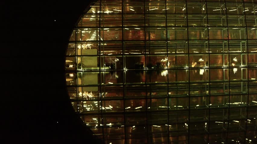 Tourists visit in BeiJing China National Grand Theatre glass house at night. gh2_04071