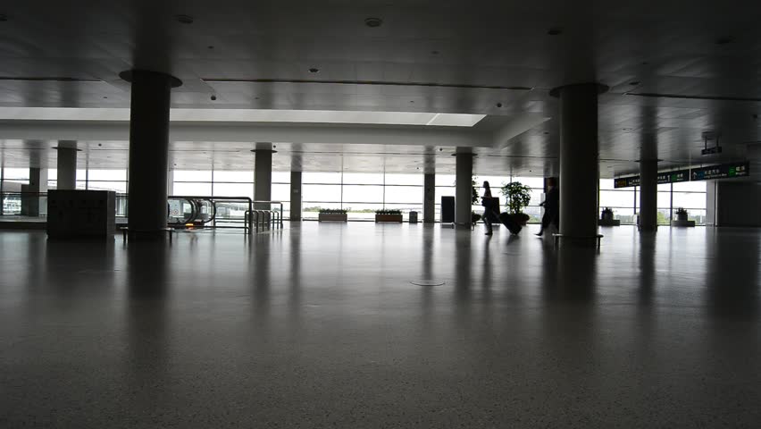 Shanghai - Jun 10,2013: (Timelapse View) People moving in the Pudong Airport on