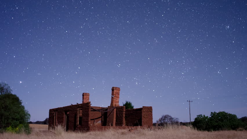 Star time lapse (astro timelapse) over the ruins of a more than one hundred year