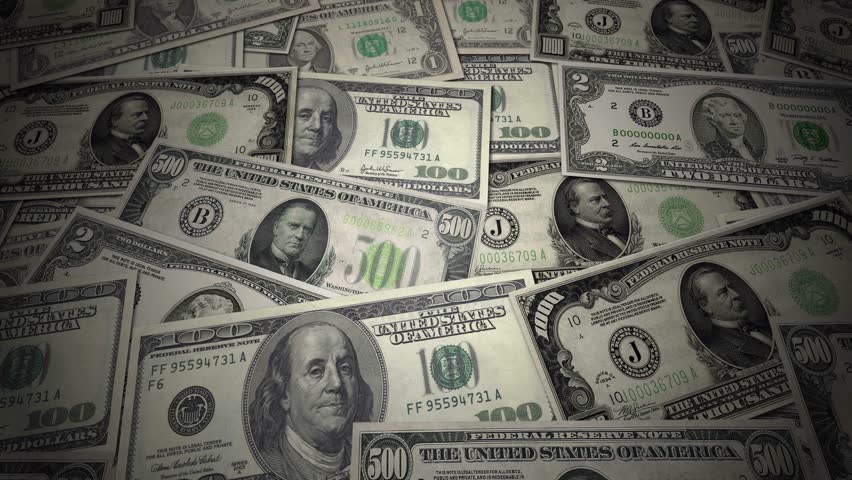 USA Money Paper Background - camera dolly across shot of American dollar bills