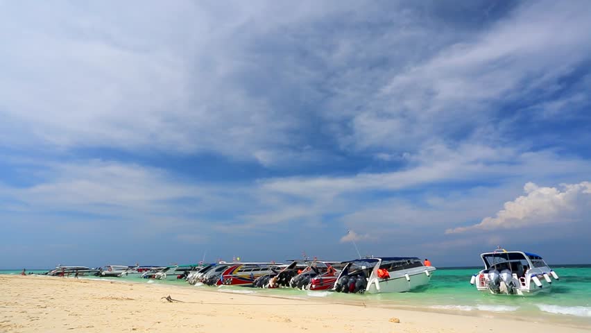BAMBOO ISLAND, THAILAND - CIRCA DECEMBER: Speedboats on a beach, on circa