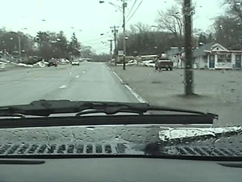 Driving down wet road
