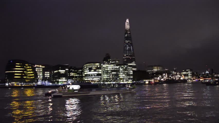 London night scape of The Shard and thames river water reflections