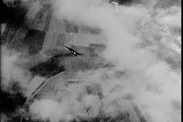 An aerial dogfight between US and German Luftwaffe fighters in World War two.