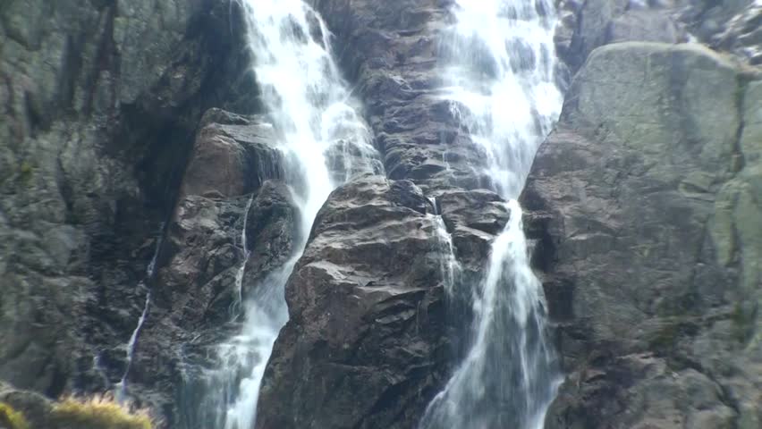 Big waterfall in mountains 