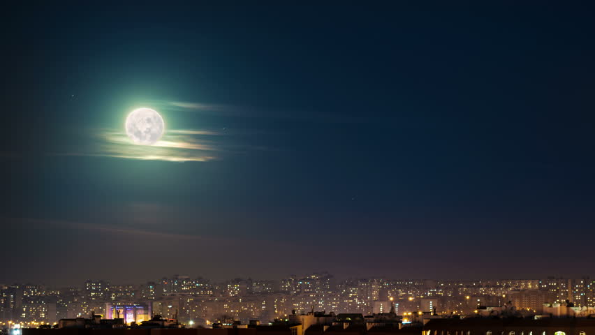 Moon over city time lapse, 4k