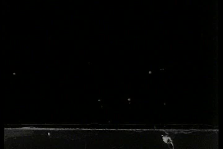 A couple of 1940s police officers respond to a traffic accident