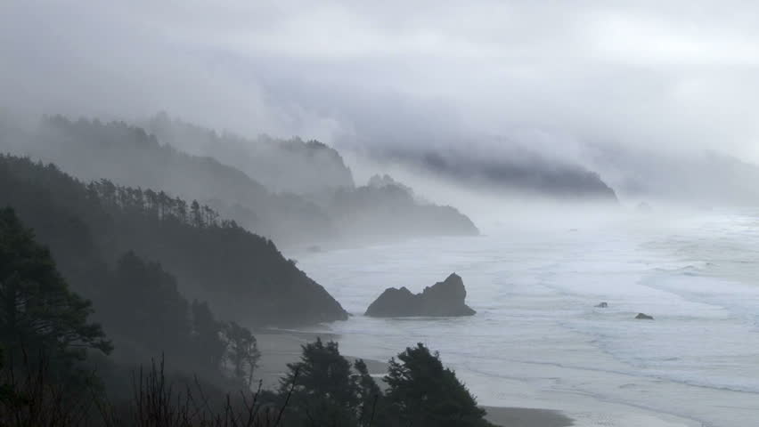 Storm brings rain and fog to the Pacific Northwest coastline in Oregon, with