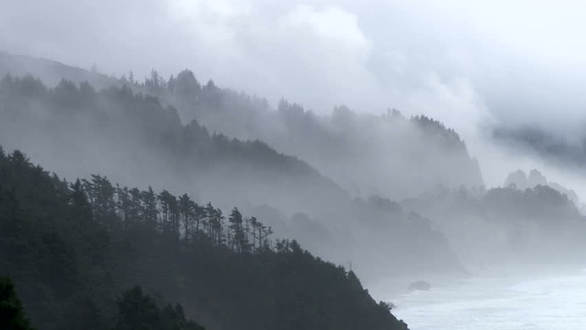 Storm brings rain and fog to the Pacific Northwest coast in Oregon, time lapse.