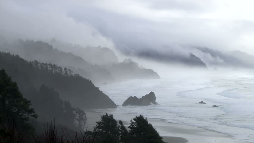 Storm brings rain and fog to the Pacific Northwest coast in Oregon, time lapse.