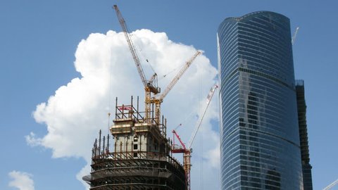 Building of modern skyscraper on sky background 