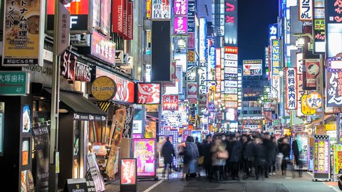 TOKYO 2013 - Panning nighttime time lapse of people walking through the Kabukicho area of Shinjuku in Tokyo, Japan