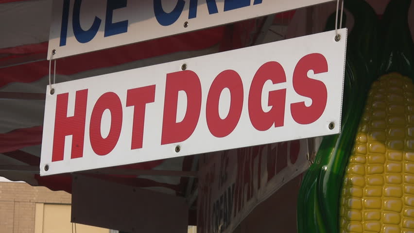 Hot dogs.  Sign advertising hot dogs for sale. 