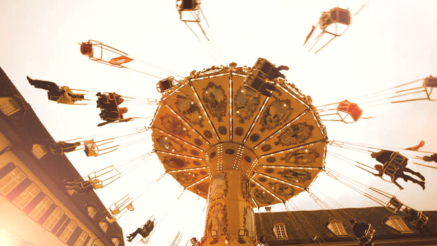 carousel roundabout. swinging turning around .amusement carnival activity fun. 1080  Royalty-Free Stock Footage #5342600