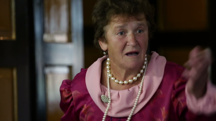Old lady angrily talking back to the mayor