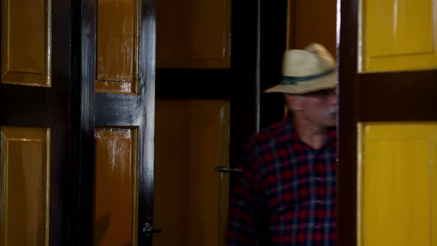 Two farmers entering the mayors office