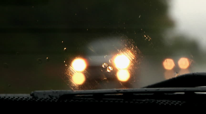 Looking through the windshield of a car on a rainy drive.  Shot at 60fps.