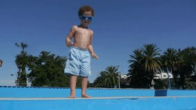 Boy jumping and diving in Swimming Pool -Slow Motion-
Perfect for videos about: swimming, pools, summer fun, vacation, getaways, underwater footage, kids, beating the heat, and exercise.