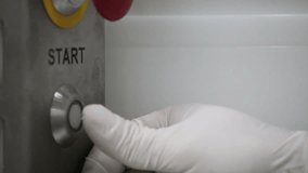 male hand in the white gloves pressing start button - Powered by Shutterstock - Get 15% off with code: PIKWIZARD15