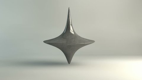 An animation showing a die-cast lead spinning top spinning on an isolated white background
