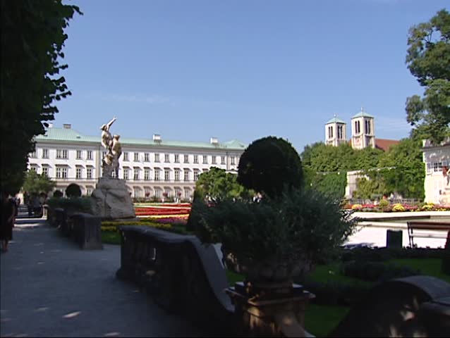 SALZBURG, AUSTRIA - Mirabell Garden with fountain, statues + pan orangery. The Palace and gardens are part of the Historic Centre of the City of Salzburg UNESCO World Heritage Site.