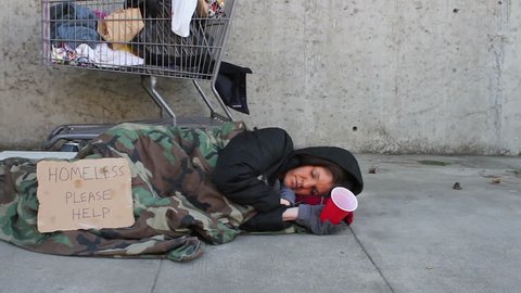 Homeless woman on the street. Shot in Riverside, California in January of 2013.