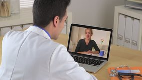 Hispanic Doctor talking to patient through video chat