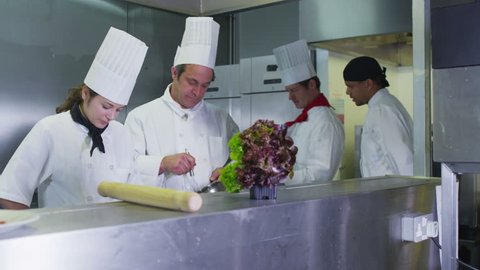 Professional chefs arranging their schedule in a restaurant or hotel kitchen
