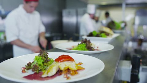 Professional chefs arranging their schedule in a restaurant or hotel kitchen