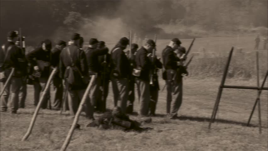 Vintage combatants firing arms (1 of 2)