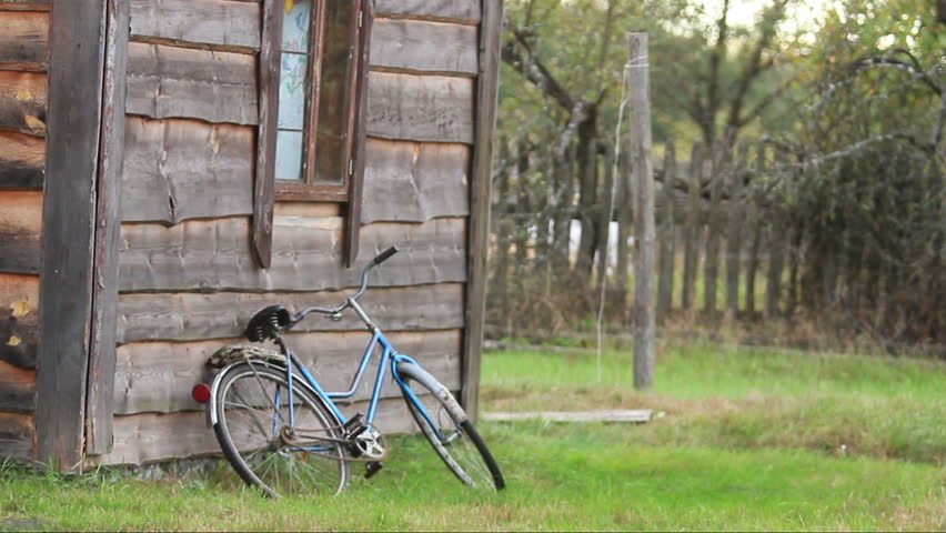 the old bicycle near the house