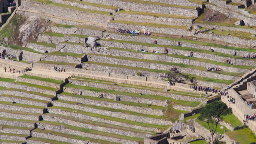 MACHU PICCHU, PERU - MAY, 2012: Machu Picchu is a 15th-century Inca site located 7,970 feet above sea level, which was declared a UNESCO World Heritage Site in 1983 and New Seven World Wonder in 2007.