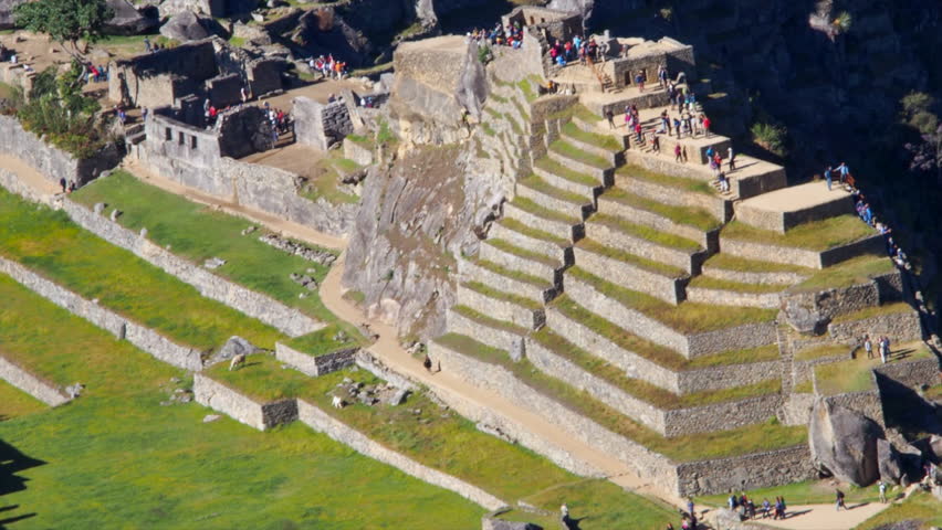 MACHU PICCHU, PERU - MAY, 2012: Machu Picchu is a 15th-century Inca site located 7,970 feet above sea level, which was declared a UNESCO World Heritage Site in 1983 and New Seven World Wonder in 2007.