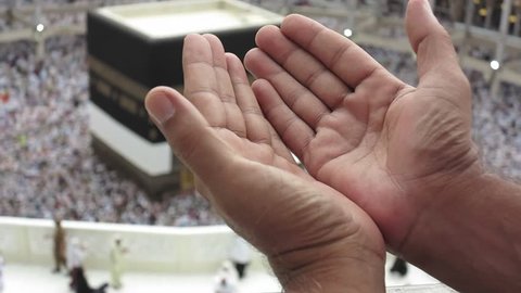 Kaaba Mecca Hajj Muslim people crowd praying and hands closeup  pov 