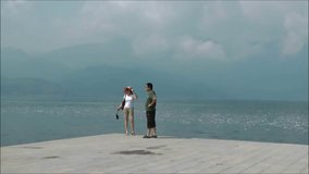 A couple and the lake scenery