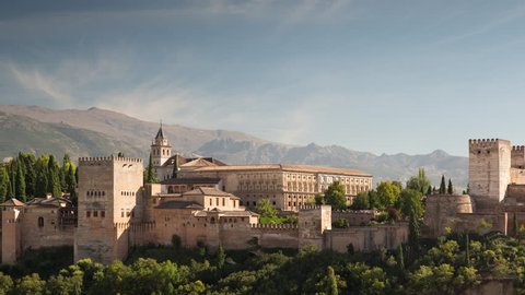 4kTime lapse of the alhambra palace in granada with the sierra nevada mountains in the distance