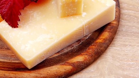 various types of cheese on wooden platter over wooden table 1920x1080 intro motion slow hidef hd
