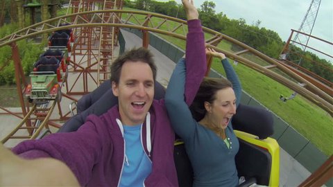 Young couple on a rollercoaster