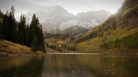 (1119) Autumn Early Snow Storm - Maroon Bells Colorado Mountains and Aspens. Great for themes of nature, travel, wilderness, seasons, weather, mountains, exploration, outdoor recreation, adventure. Stock Video
