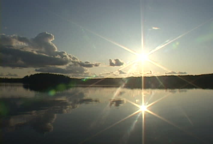 Time Lapse in Minnesota at lake in the Boundary Waters near Canada. Sun shines