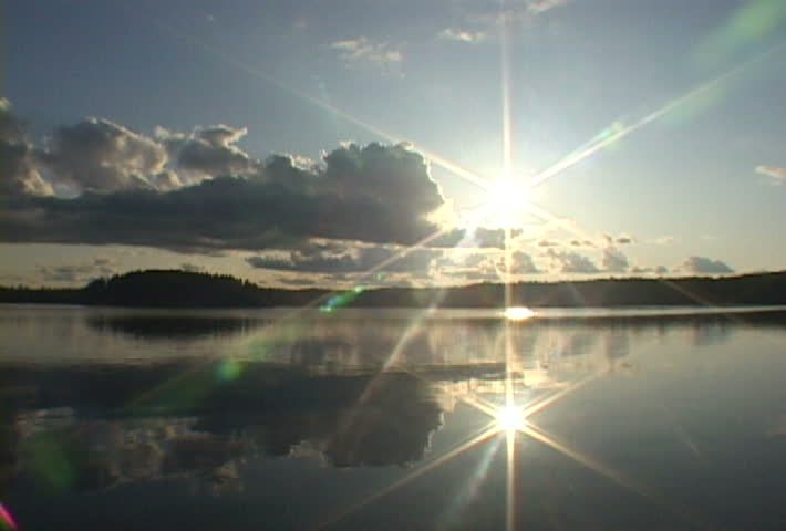 Time Lapse in Minnesota at lake in the Boundary Waters near Canada. Sun shines