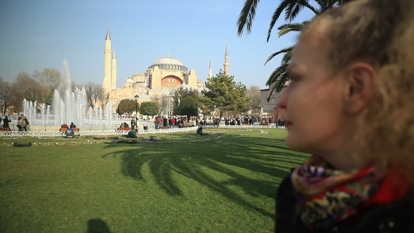 Tourist Woman watching Hagia Sophia, Istanbul.