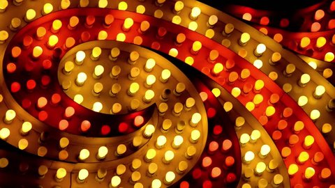 flashing red and yellow marquee spiral