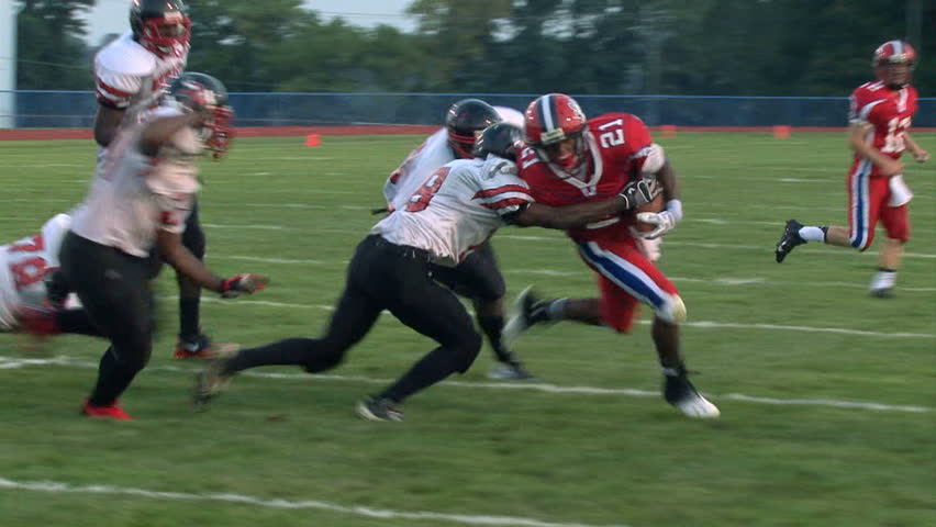 LANGHORNE, PENNSYLVANIA - AUGUST 30 RB D'Andre Pollard (#21, Redskins) at Neshaminy High School breaks 5 tackles and runs into the end zone for a touchdown against Northeast HS, on August 30th, 2013.